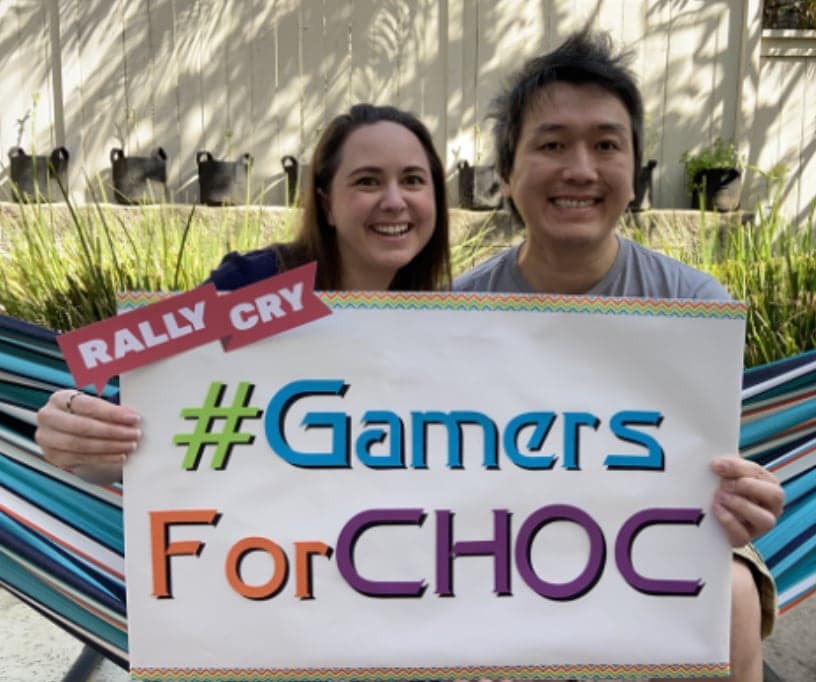 Supporters holding a #GamersForCHOC sign