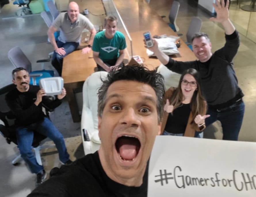 A team celebrating at a Gamers for CHOC event